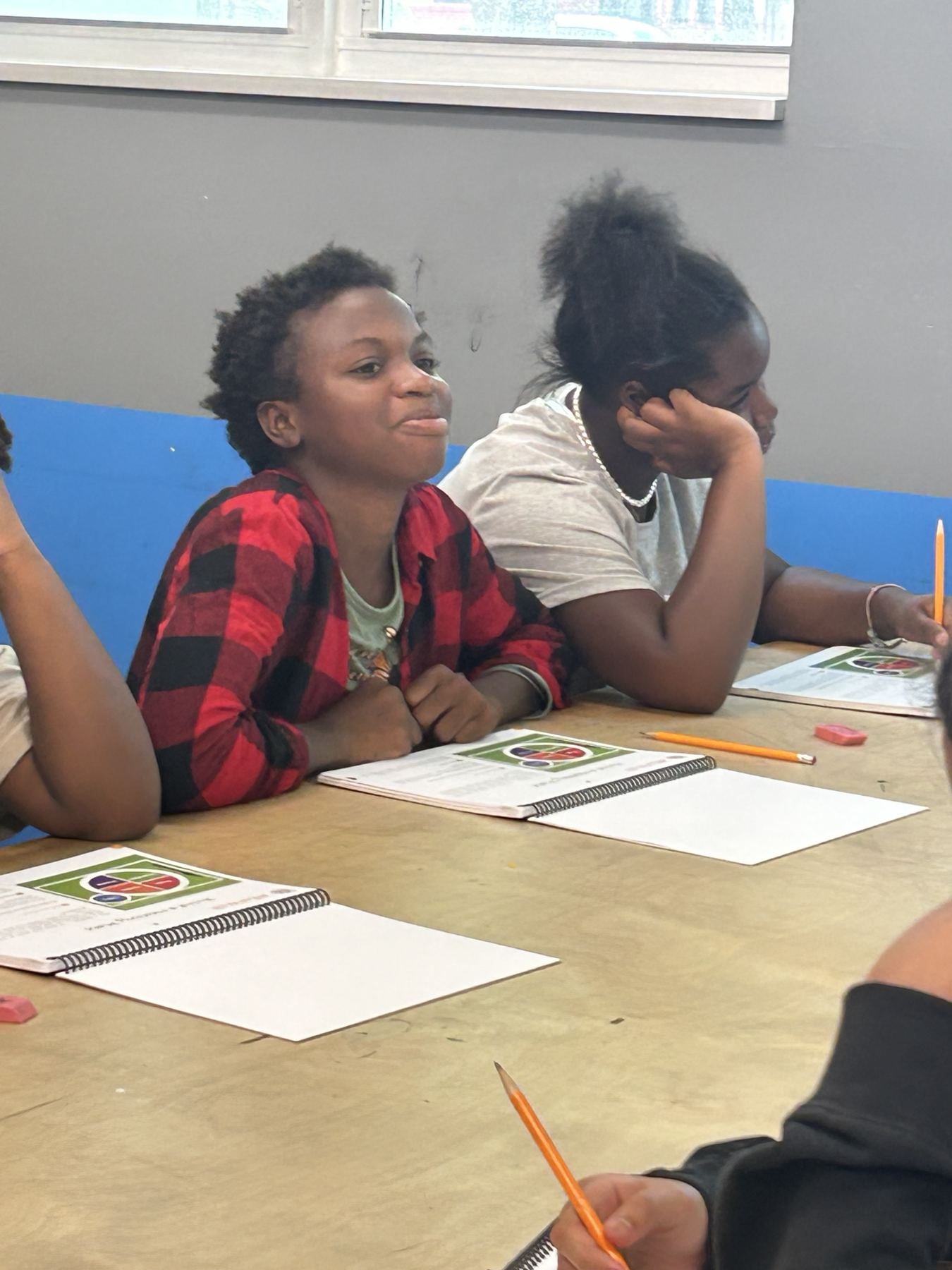 Youth participants working through a foundation education activity